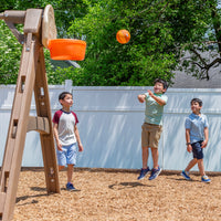 Naturally Playful™ Adventure Lodge Play Center with Glider boys playing basketball