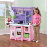 Little Baker's Kitchen™ with child playing