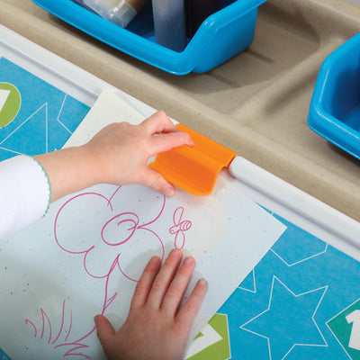 2-in-1 Toy Box & Art Lid™ clip to hold art in place