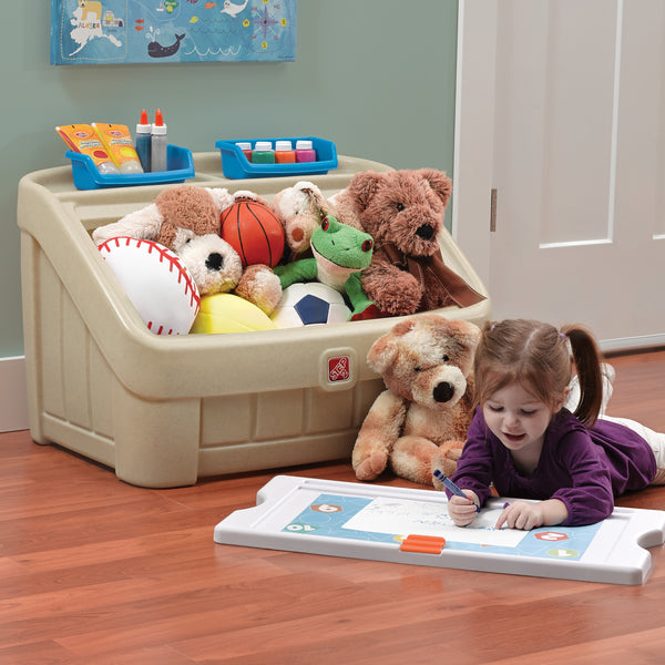 2-in-1 Toy Box & Art Lid™ lid being used as art board
