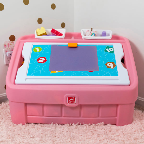 2-in-1 Toy Box & Art Lid™ art clip holds paper on lid