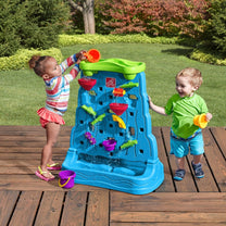 Waterfall Discovery Wall with kids playing outdoors