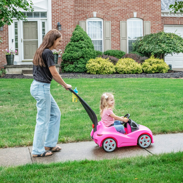 Whisper Ride Cruiser™ - Pink with child riding