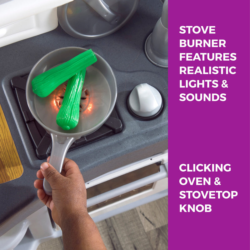 Love to Entertain Kitchen™ stove burner has realistic lights and sounds