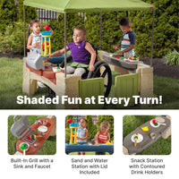 All Around Playtime Patio with Canopy with built-in grill sand and water station and snack station