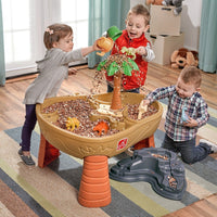Dino Dig Sand & Water Table with kids playing