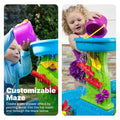 Rain Showers Splash Pond Water Table™ with Cover child pouring water to create a rain shower