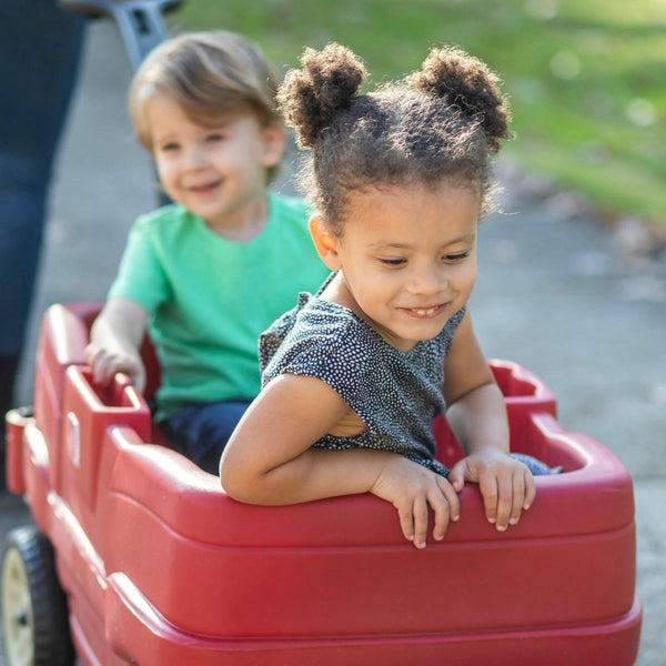 Neighborhood Wagon™ with kids being taking for a ride