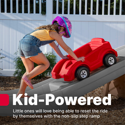 Extreme Thrill Coaster™ child pushing car up track on the non-slip step ramp